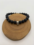 Wooden bead bracelet with silver skull